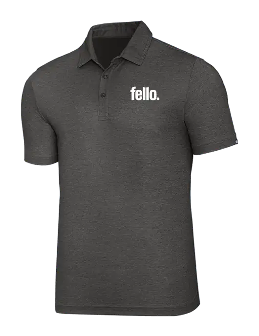 TravisMathew Black Heather Oceanside Polo w/Fello. Logo